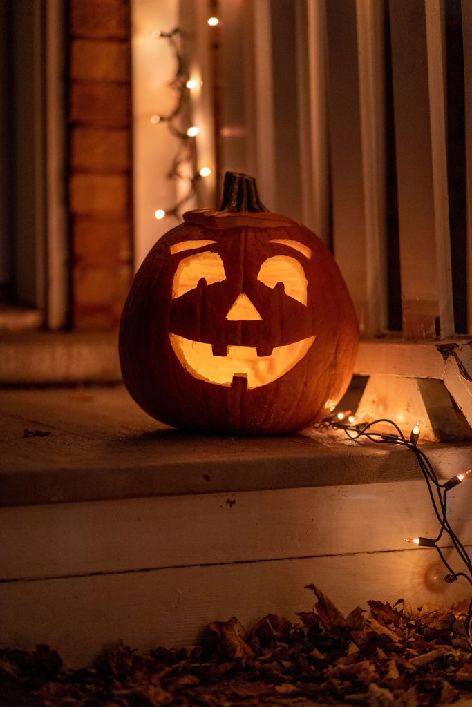 A friendly Haloween pumpkin on a doorstep